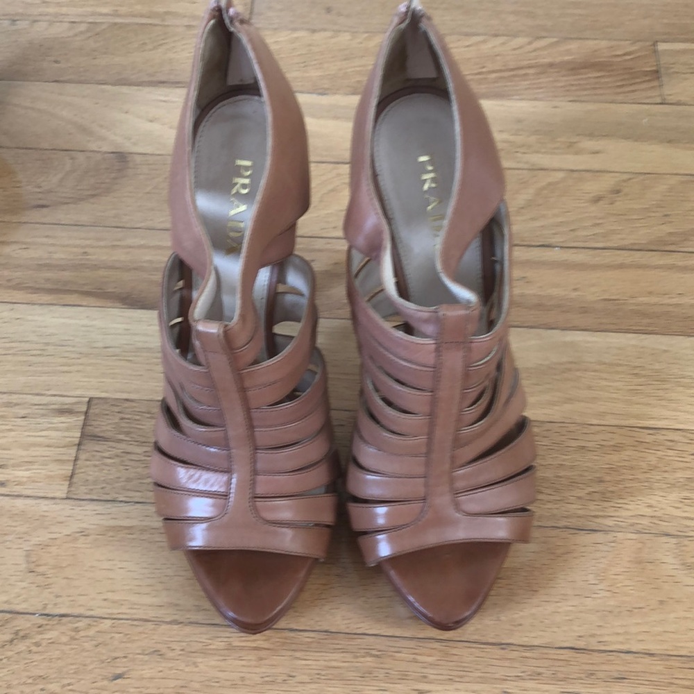 Gently worn Prada nude strappy heel.